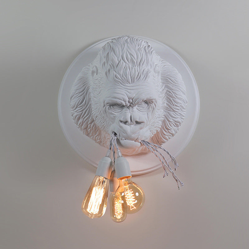 Lámpara de pared con cabeza de gorila