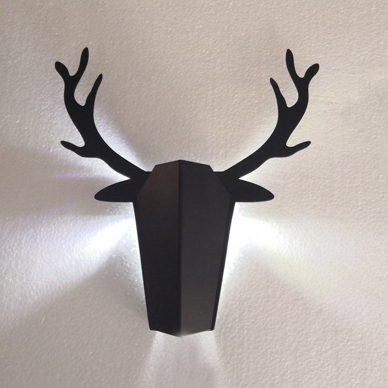 "Stylized elk-head wall lamp"