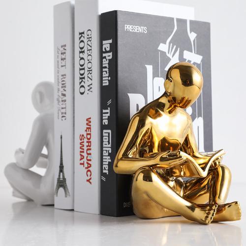 Ceramic Bookend | Stylized Figure of Man Reading, White, Black, and Gold Design