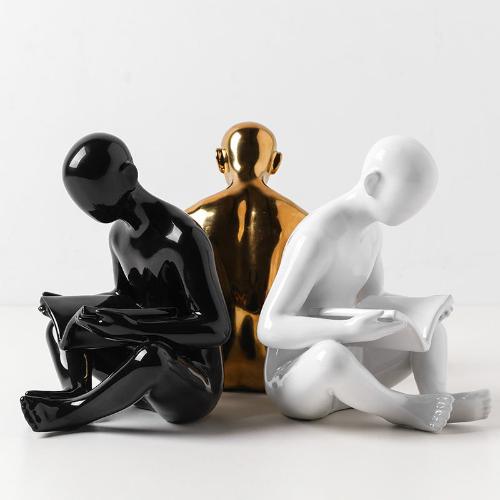 Ceramic Bookend | Stylized Figure of Man Reading, White, Black, and Gold Design