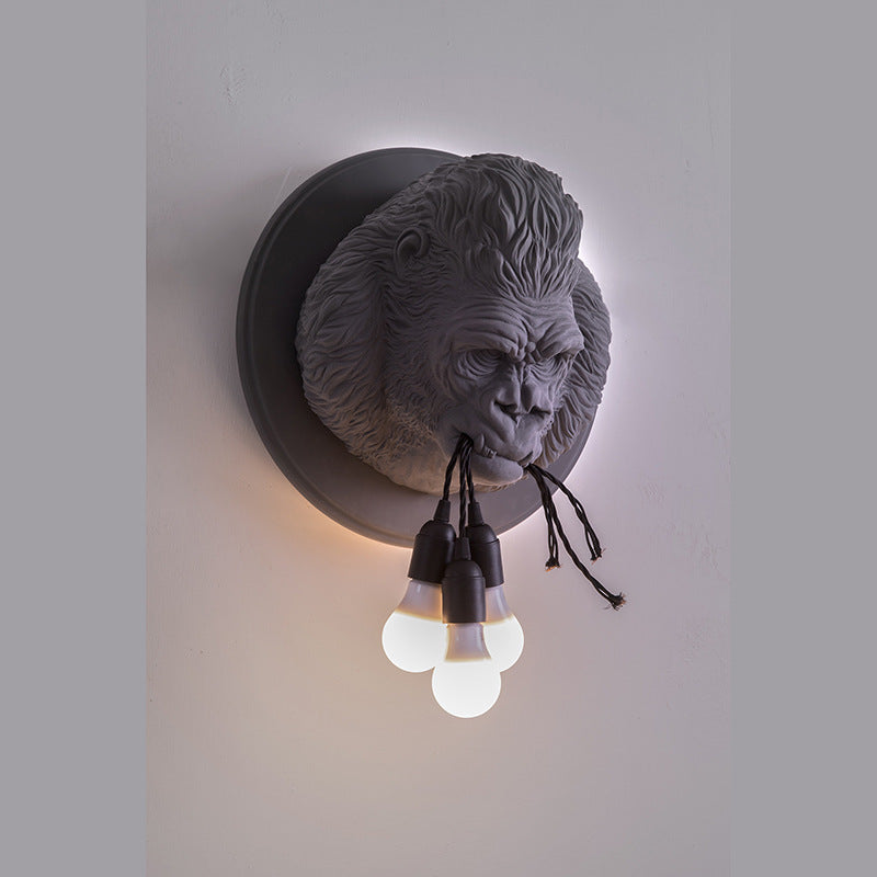 Lámpara de pared con cabeza de gorila