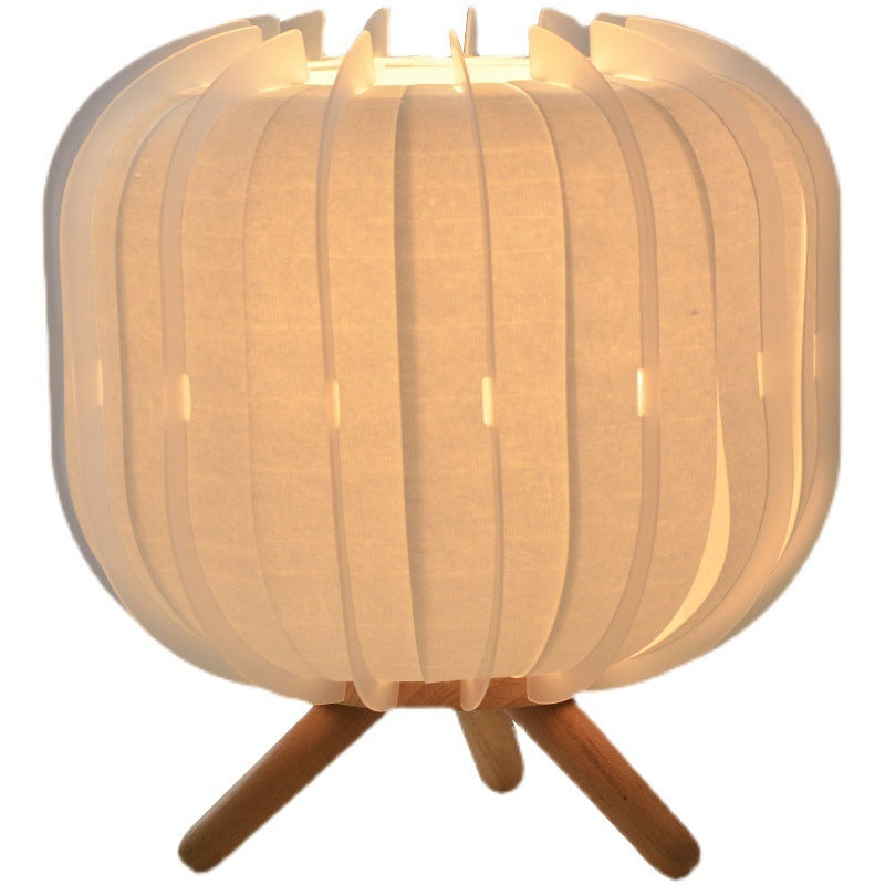 "Japanese Style Table Lamp with Solid Wood Base and Artisanal Shade"