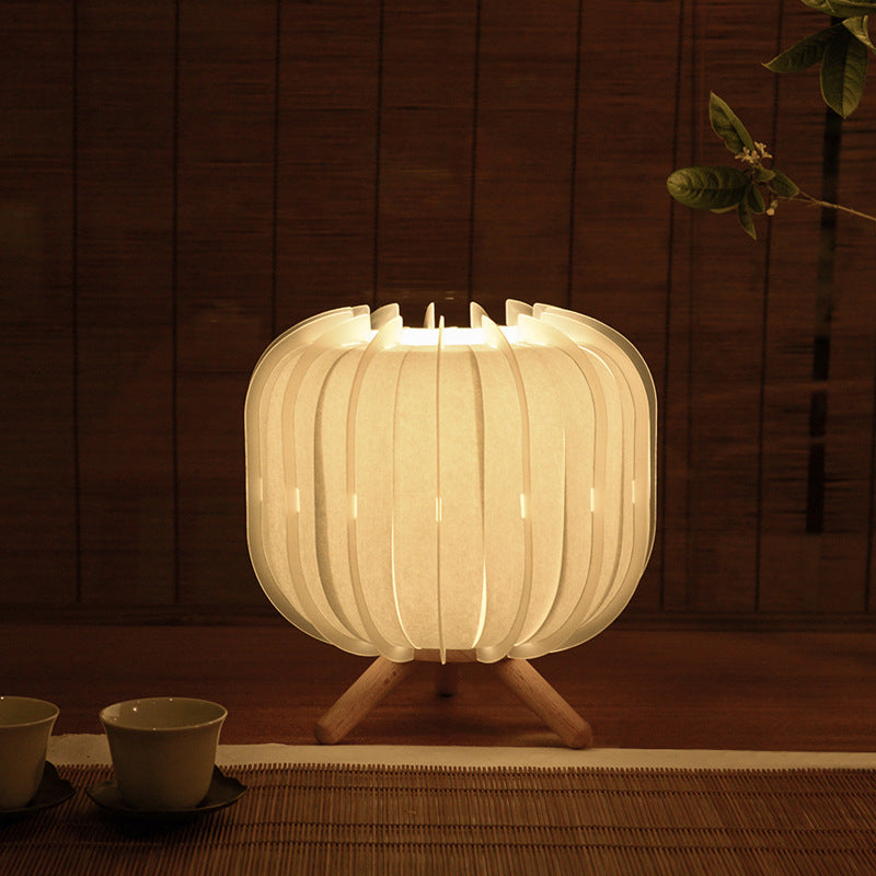 "Japanese Style Table Lamp with Solid Wood Base and Artisanal Shade"