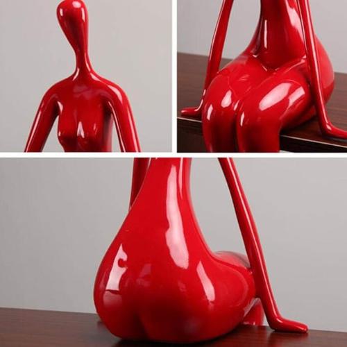 "Red Woman Statue: Modern and Provocative Art for Creative Decor"