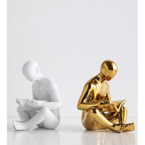 Ceramic Bookend | Stylized Figure of Man Reading, White, Black, and Gold Design